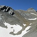 View from Fuorcla Cagniel towards Piz Cagniel (the summit itself is not visible yet). I tried to hike just below the rock wall at the right side, but in the loose scree I drifted further down towards the snowfield.

Remark: Interestingly, 100 years ago there was a [https://s.geo.admin.ch/83ab28d9db tiny glacier] in the upper part.