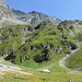 Back down in the valley Val Curtegns. For the ascent I used the couloir on the left side as described by [u ivo66]. For the descent I came down through a short but steep couloir (upper right), and then across the grassy hillside. See the next photo for more details.