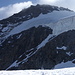 Im Abstieg vom Gran Paradiso - Rückblick im Gegenlicht zu dessen Gipfelbereich.