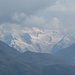 Die minütlich wechselnden Wolken erlauben ab und zu die Sicht auf das Berninamassiv.