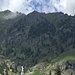 Sulla destra l'erboso vallone del Rio del Bisign che percorreremo al ritorno e che costituisce l'accesso più semplice per l'Alpe Turiggia (in una foto di due anni fa)