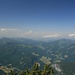 auf dem Großen Weitschartenkopf mit Blick zu den Chiemgauer Alpen, ganz hinten im Dunst der Wilde Kaiser