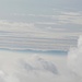 WoW. Die Wolken reissen auf geben den Blick auf einen Höhenzug in der Schweiz frei