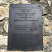 Hermannskogel - Eine Tafel an der Außenmauer des Turms informiert über den Fundamentalpunkt der österreichischen Landesvermessung, der sich hier befindet.