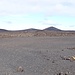 Attorno al Volcan El Cuervo, sullo sfondo i vulcani di Timanfaya e la Caldera Colorada.