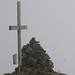 Once again the summit cross of Zuestoll in the fog