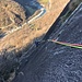 roccia "bollata" bianca attorno agli spit, visibile anche dalla strada!