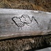 Curious carving on a bench.