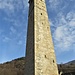 Il campanile di Montecrestese che riveste l'originaria torre campanaria romanica.