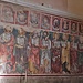 Sulla parete di sinistra si trovano le raffigurazioni degli Apostoli ed in alto quelle dei Profeti.
