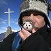 Ginger and myself shaken by strong wind on the summit of Cima di Medeglia.
