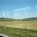 Rückblick aus der Bahn auf die beiden Weingartener Berge, den Katzenberg links und den Kirchberg rechts.