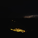 Scuol by night: der Nachthimmel im Bündnerland von Gewittern erleuchtet.