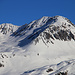 Foto vom 1. Besteigungsversuch am 5.1.2020 mit Ski:<br /><br />Foto von Era da la Bescha (2200m) im Zoom auf den Piz Starlex (3075m).