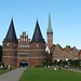Holstentor Lübeck mit Salzspeichern und Petrikirchturm
