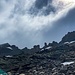 Torrioni della cresta ovest Cima Rossa nelle nuvole