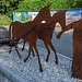 Orezzo, monumento commemorativo ad un trasportatore del tipico locale marmo nero