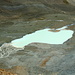 il lago originato dal vadret d'Agnel soprastante