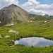 Kleine Seen oberhalb Alp Trida.<br />Piz Munschuns, Trider Sattel.