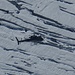 Ausblick vom Silvrettahorn: Ein Helikopter über dem Ochsentaler Gletscher