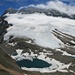 Tiefblick vom Gipfel 2946 m.ü.M. auf den namenlosen, teilweise noch eisbedeckten See und Monte Leone mit Chaltwassergletscher