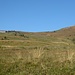 Risalire il vallone sino allo chalet (sx della foto)