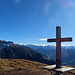 Kreuz on Top of Chrüz mit Silvretta im Hintergrund