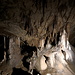 Unterwegs in den Škocjanske jame (Höhlen von Škocjan) - Beim Passieren weiterer Sinter- und Tropfsteingebilde.