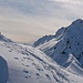 Auf dem Gipfel Chlin Hüreli mit Blick zum Tscheischhorn (links) und Cima di Camutsch (rechts).