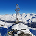 Gipfelkreuz mit Blick auf die höchsten Gipfel des Oberhalbsteins....