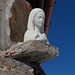 Busto di Madonna su uno spigolo del Rifugio Città di Busto.