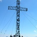 Das Gipfelkreuz repräsentiert verschiedene Handwerke