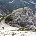 die Kleine Wechselspitze wird kleiner; 2 Bergsteiger sitzen am Gipfel