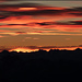 Sonnenaufgang vom Gipfel des Piz Languard. Cumuli lenticulares (Föhnfische) am Morgenhimmel. (keine UFO's)