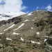 dall'Alpe Corwetsch, vista sull'innevata Punta Valgrande e sul fondamentale e prestigioso rilievo del Dosso (con dolmen sulla cima)