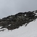 Hier bin ich steil über Geröll und Fels die NO Flanke direkt hoch (T4) zum Gipfel des Piz Muttala.