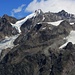 Aussicht vom Hüttenweg zur Weisshornhütte:<br /><br />An den Gipfel vom Nadelgrat hinter der Hohgwächte (3740m) haben sich die Wolken nun verzogen. Die Gipfel vom Nadelgrat von links nach rechts sind: Chli Dirruhorn (3890m), Dirruhorn (4035m), Hohbärghorn (4219m), Stecknadelhorn (4241m), Nadelhorn (4327,1m) und Lenzspitze (4294m).