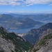 La Val Scarettone, il lago di Como col suo ramo di Lecco, il gruppo del Rosa sullo sfondo. Sulla parte sinistra della foto ben visibile il Rifugio Rosalba.
