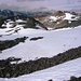 Im Vordergrund die Fuorcla Vallorgia, am Horizont die Berninagruppe im Nebel