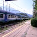 Der Regionalzug aus Domodossola Richtung Milano, Porto Garibaldi fährt ein. Diese Züge werden normalerweise aus einer stattlichen Anzahl Waggons des Typs <a href="http://it.wikipedia.org/wiki/MDVC" rel="nofollow">MDVC</a> gebildet und bieten jede Menge Sitzplätze.