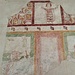 Affreschi sul lato sud della chiesa o nord del chiostro, il muro infatti è condiviso tra la chiesa e il chiostro. La datazione degli affreschi dipende quindi dal fatto che essi vengano attribuiti al muro della chiesa o alla successiva costruzione del chiostro.