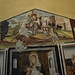 Nella parte alta dell'affresco San Giorgio uccide il drago, un classico dell'iconografia cristiana.