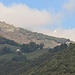 Il "Fiore di Pietra" sul Monte Generoso seminascosto dalle nubi visto da Cragno.