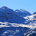 Prodkamm (2006,1m): Blick im Zoom vom Gipfel auf die von Wind gezeichneten 3000er Surenstock / Piz Sardona (3055,8m) und Piz Segnas (3098,6m).