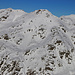 Piz Lagalb (2959,0m): Gipfelaussicht zum Doppelgipfel des Piz Minors (vorn Hauptgipfel 3049,2m, links Pitschen 3042m). Im Hintergrund ist der Piz la Stretta / Monte Breva (3104m).<br /><br />Aufm Piz Minor war ich auch schon mit Ski bei Eiseskälte: [https://www.hikr.org/tour/post61171.html]