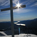 Summit cross on Madone and Lago Maggiore in the back