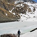 Il Lago del Sasso ghiacciato ai piedi del Pizzo dei Tre Signori.