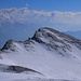 Blick auf den vom Wind abgeblasenen Crap Ner (2781m) von der Bergstation La Siala (2806m).