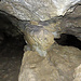 Bei der Kammer (ungefähr in der Hälfte der Höhle) wird die Höhle ein bisschen niedriger und an diesem Tag hatte es relativ viel Wasser  am Boden, da es erst noch geregnet hatte.