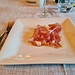 <b>La cena in albergo comincia con un antipasto di Speck e scaglie di Grana Padano.</b>